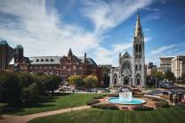 banner of Saint Louis University - INTO USA